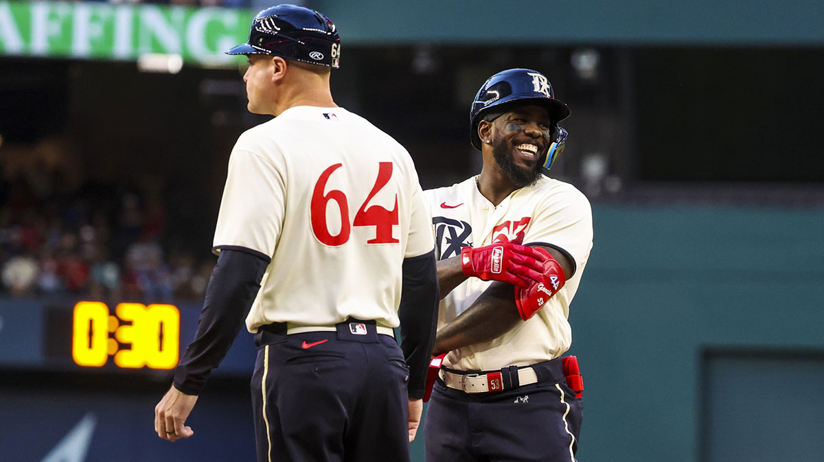 Texas Rangers right fielder Adolis Garcia (53) laughs after hitting an rbi single during the first inning against the Oakland Athletics at Globe Life Field.