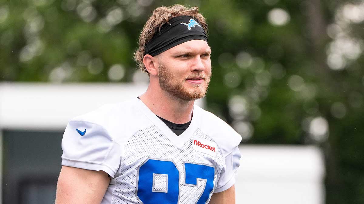 Detroit Lions defensive end Aidan Hutchinson (97) walks off the field after practice during training camp at Meijer Performance Center in Allen Park on Sunday, July 20, 2025.