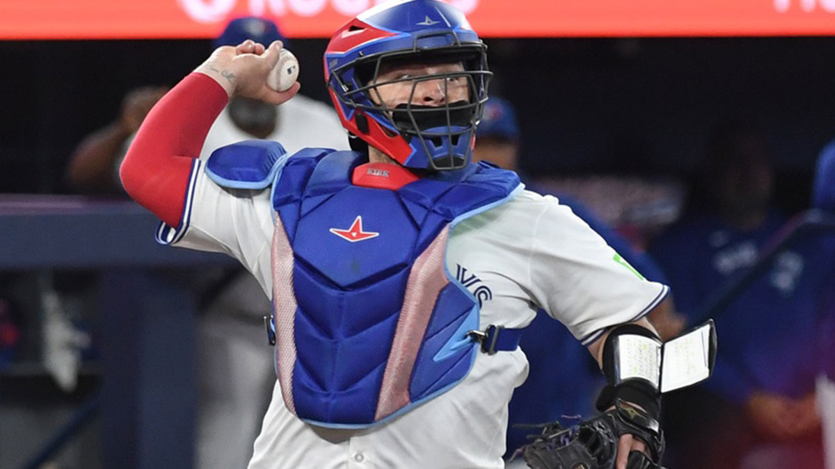 Toronto Blue Jays catcher Alejandro Kirk (30) throws to first base to complete a double play against the Los Angeles Angels in the fourth inning at Rogers Centre.