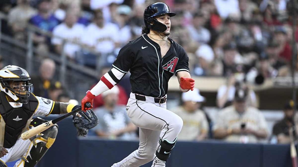 Arizona Diamondbacks center fielder Alek Thomas (5) hits a double during the third inning against the San Diego Padres at Petco Park.