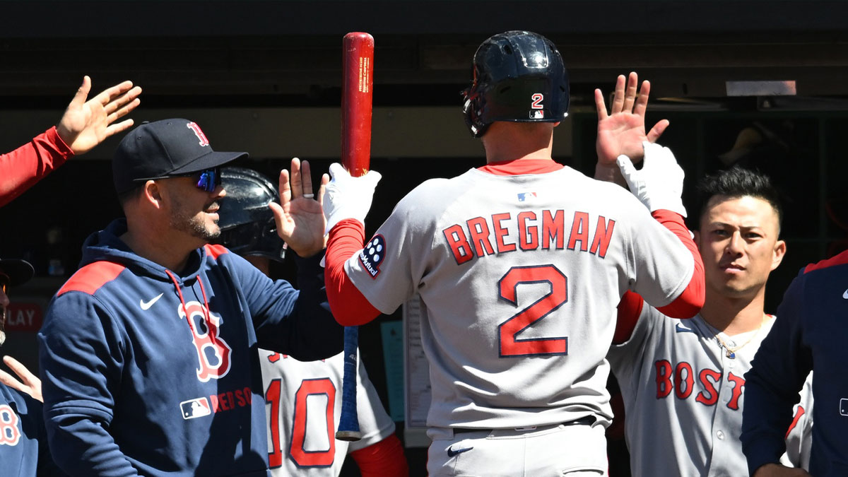 Boston Red Sox third baseman Alex Bregman (2) celebrates after scoring during the fifth inning against the Cleveland Guardians at Progressive Field.