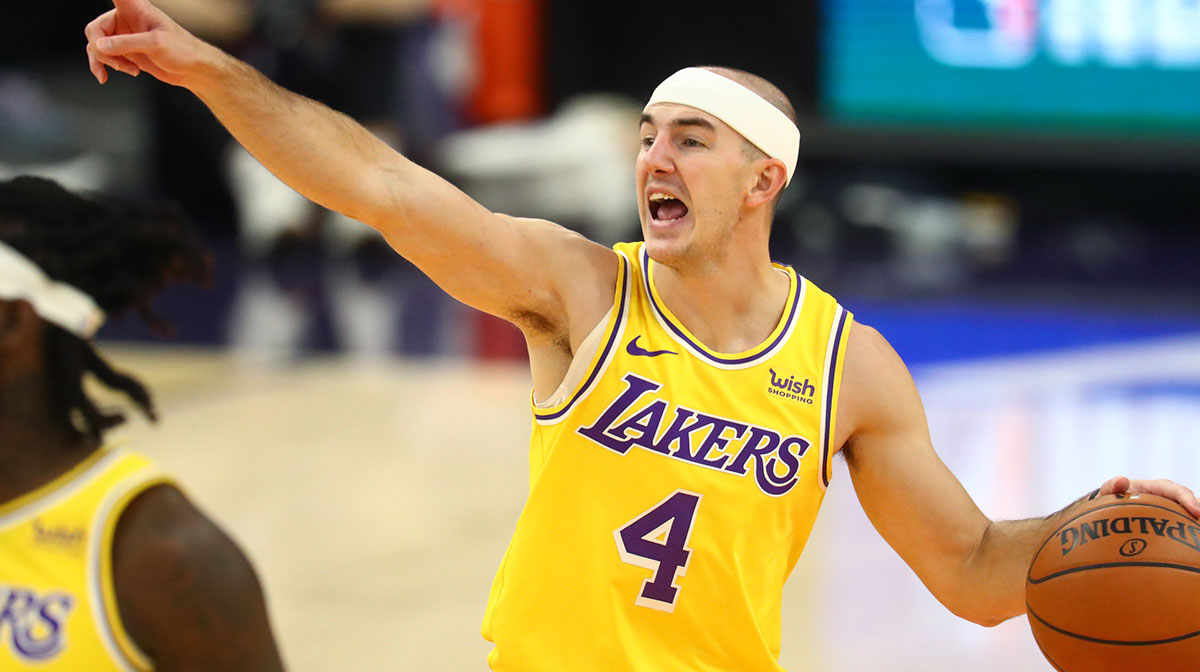 Los Angeles Lakers guard Alex Caruso (4) reacts against the Phoenix Suns during a preseason game at Phoenix Suns Arena.