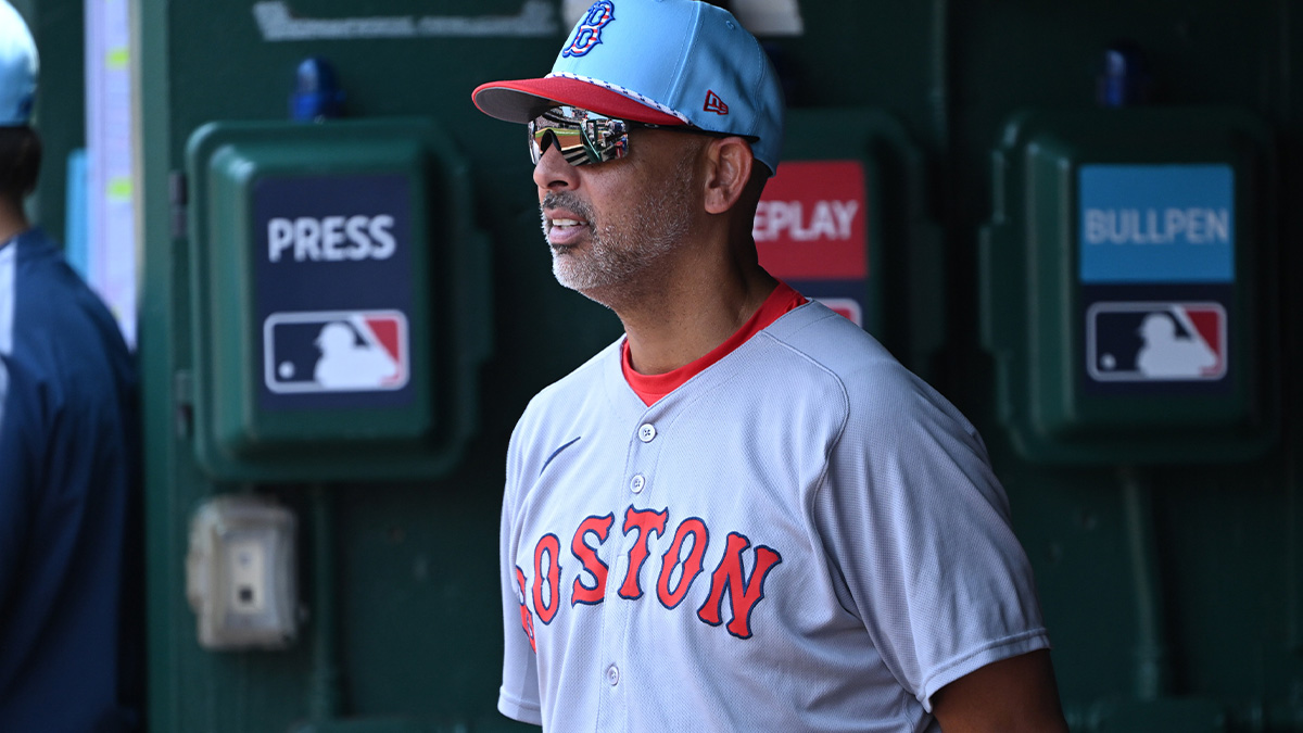 Boston Red Sox manager Alex Cora (13) stands in the dugout during the eighth inning of a game against the Washington Nationals at Nationals Park.