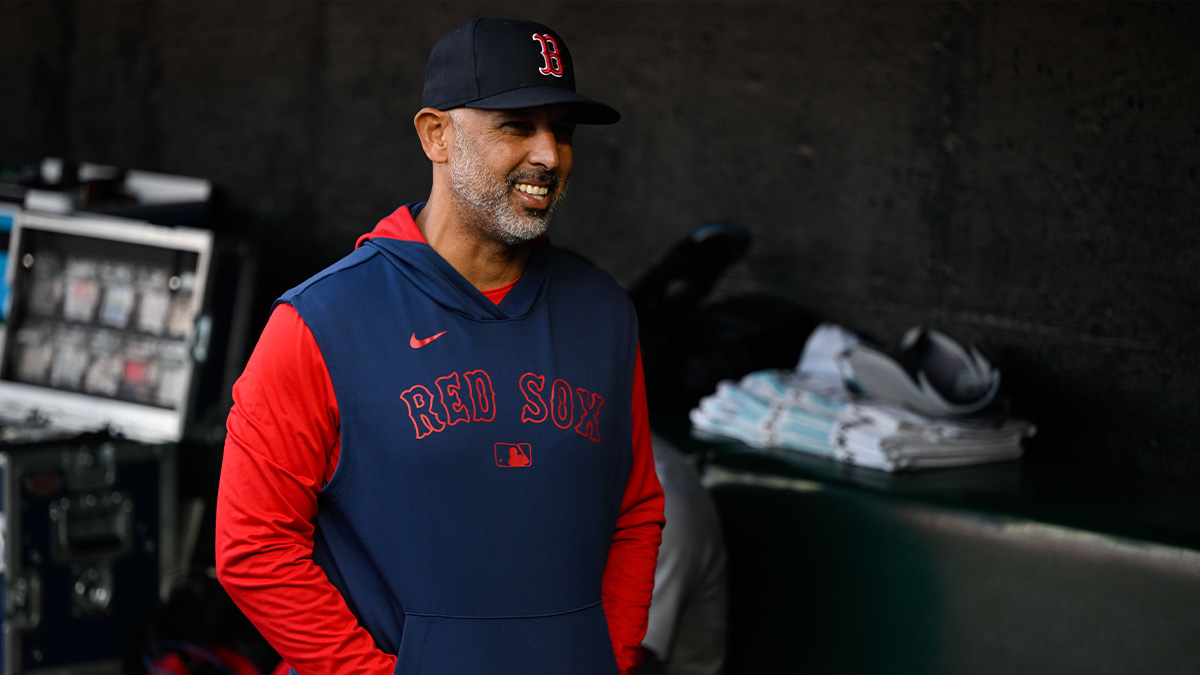 California, USA; Boston Red Sox manager Alex Cora stands in the dugout before their game against the San Francisco Giants at Oracle Park.