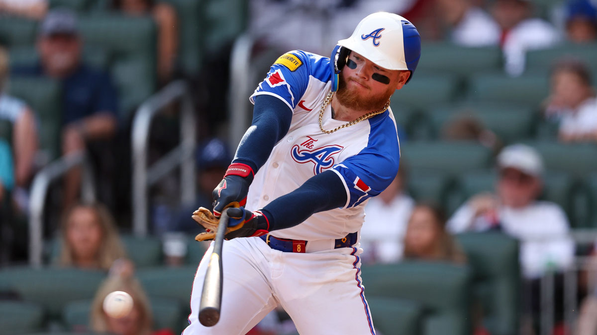 Atlanta Braves left fielder Alex Verdugo (8) hits a single against the San Diego Padres in the seventh inning at Truist Park.