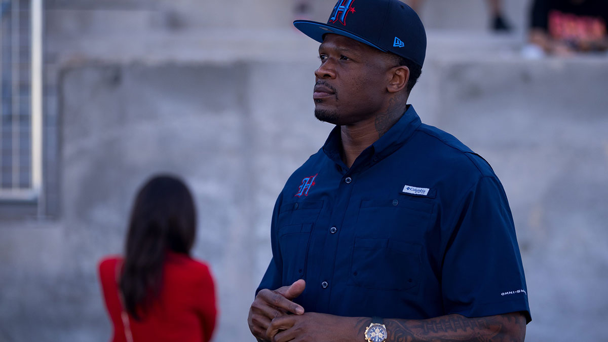 Andre Johnson, former Houston Texans player, stands on the field before the inaugural flag football championship game at SAC II in El Paso, Texas, on May 22, 2025.