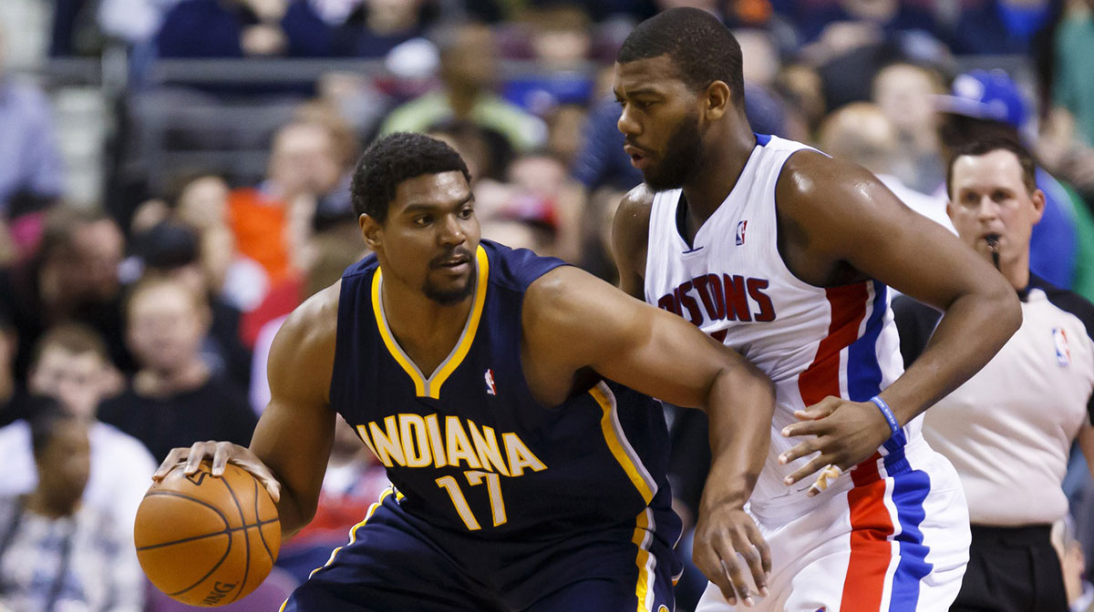 Indiana Pacers center Andrew Bynum (17) is defended by Detroit Pistons forward Greg Monroe (10) in the second quarter at The Palace of Auburn Hills.