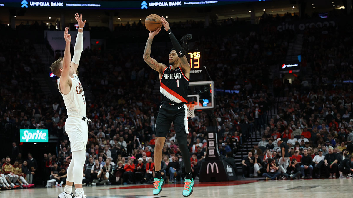 Portland Trail Blazers guard Anfernee Simons (1 a boston celtics player now) shoots the ball over Cleveland Cavaliers guard Sam Merrill (5) in the second half at Moda Center.