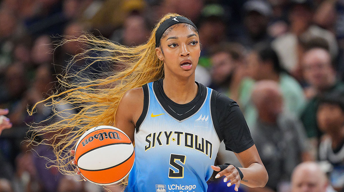 Chicago Sky forward Angel Reese (5) dribbles against the Minnesota Lynx in the first quarter at Target Center.