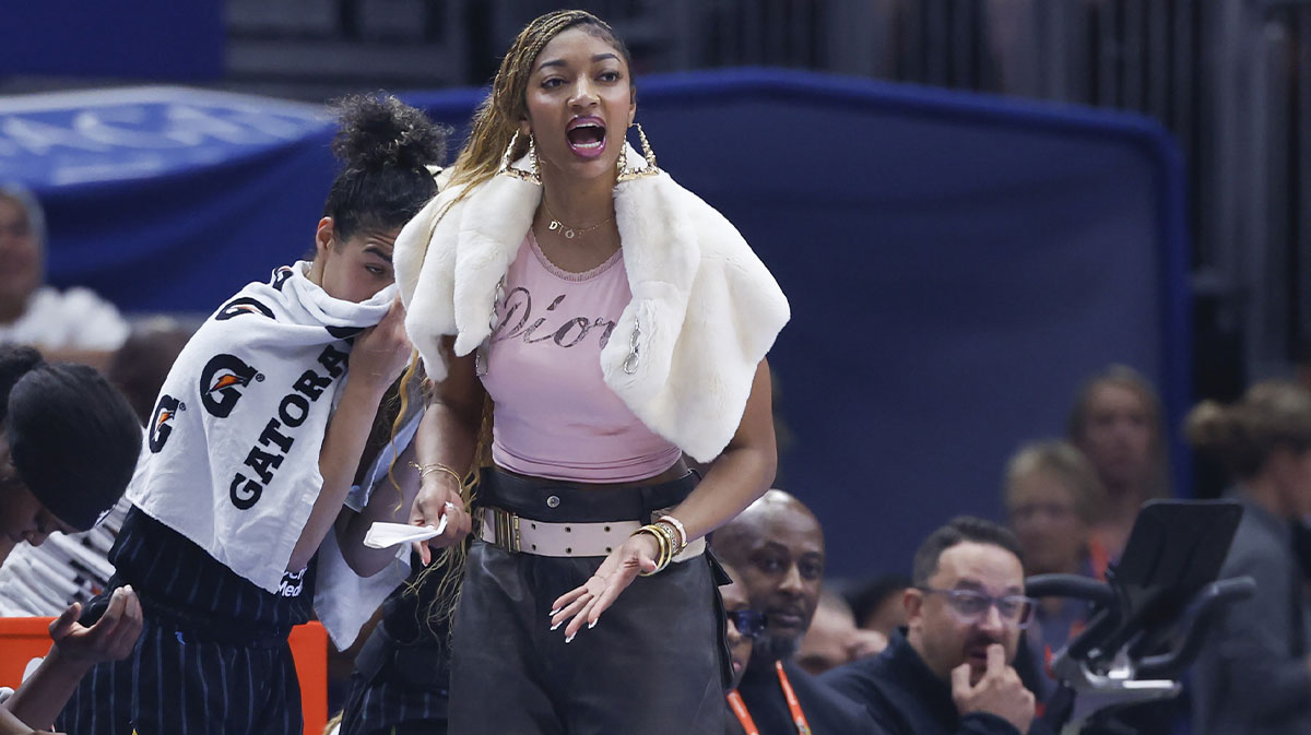 Injured Chicago Sky forward Angel Reese (5) reacts from the bench during the first half of a basketball game against the Indiana Fever at United Center.