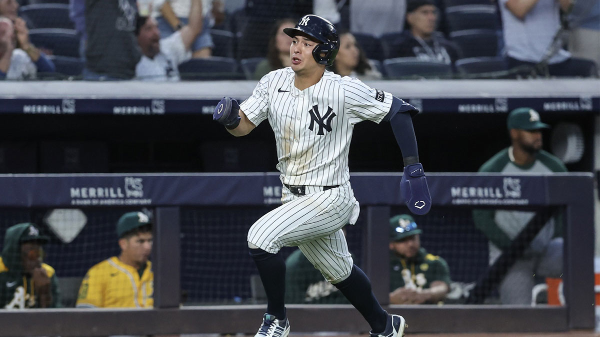 New York Yankees shortstop Anthony Volpe (11) runs to home plate in the third inning against the Athletics at Yankee Stadium