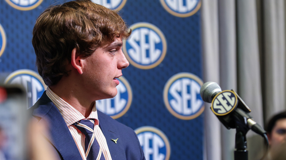 Texas Longhorns quarterback Arch Manning answers questions from the media during SEC Media Days at Omni Atlanta Hotel.