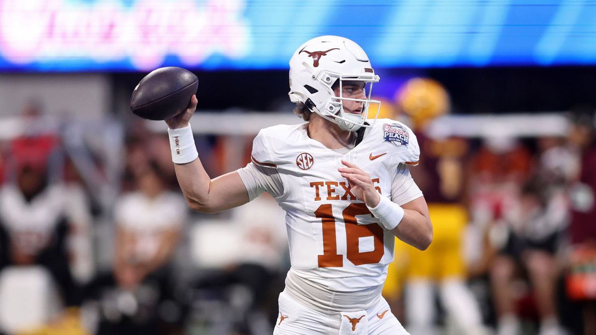 Texas Longhorns quarterback Arch Manning (16) warms up before the Peach Bowl at Mercedes-Benz Stadium.