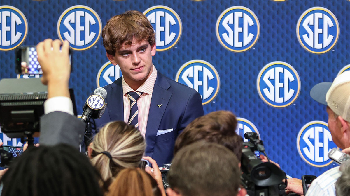 Texas Longhorns quarterback Arch Manning answers questions from the media during SEC Media Days at Omni Atlanta Hotel.