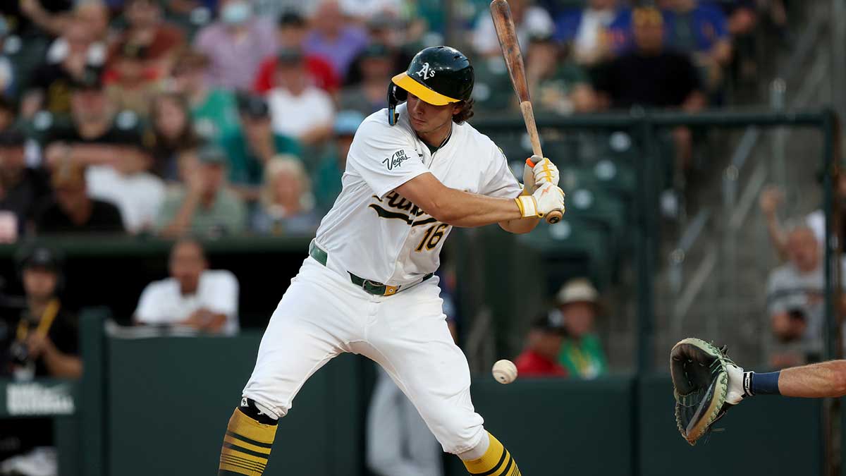 Athletics first baseman Nick Kurtz (16) gets hits by a pitch against the Seattle Mariners during the third inning at Sutter Health Park.