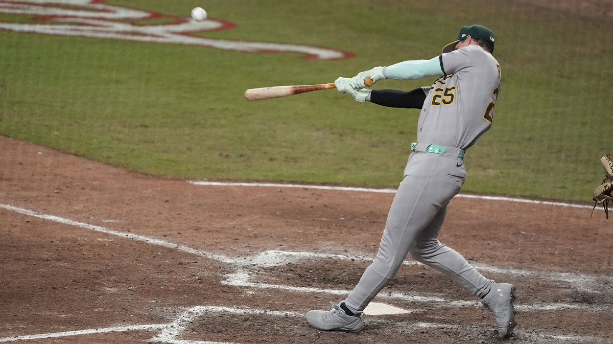 National League designated hitter Brent Rooker (25) of the Athletics hits a home run during the swing off after the 2025 MLB All Star Game ended in a tie at Truist Park.