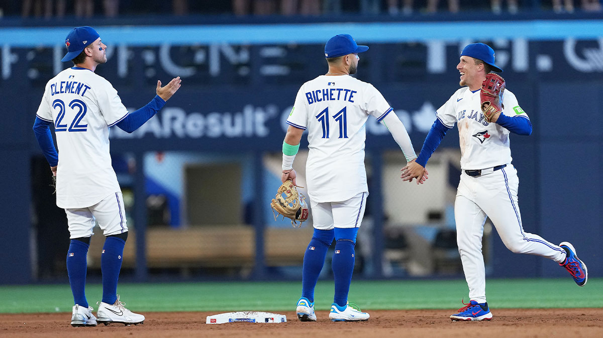 Toronto Blue Jays shortstop Bo Bichette (11) celebrates the win with centre fielder Myles Straw (3) against the New York Yankees at the end of the ninth inning at Rogers Centre.