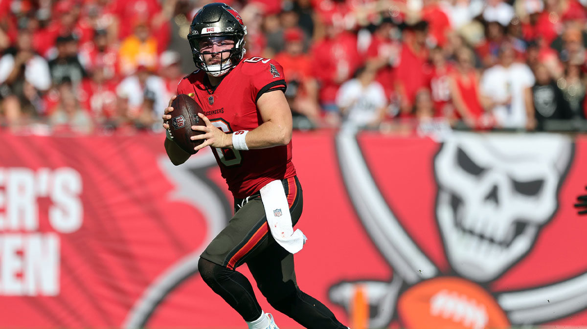 Dec 8, 2024; Tampa, Florida, USA; Tampa Bay Buccaneers quarterback Baker Mayfield (6) runs out of the pocket against the Las Vegas Raiders during the second quarter at Raymond James Stadium. 