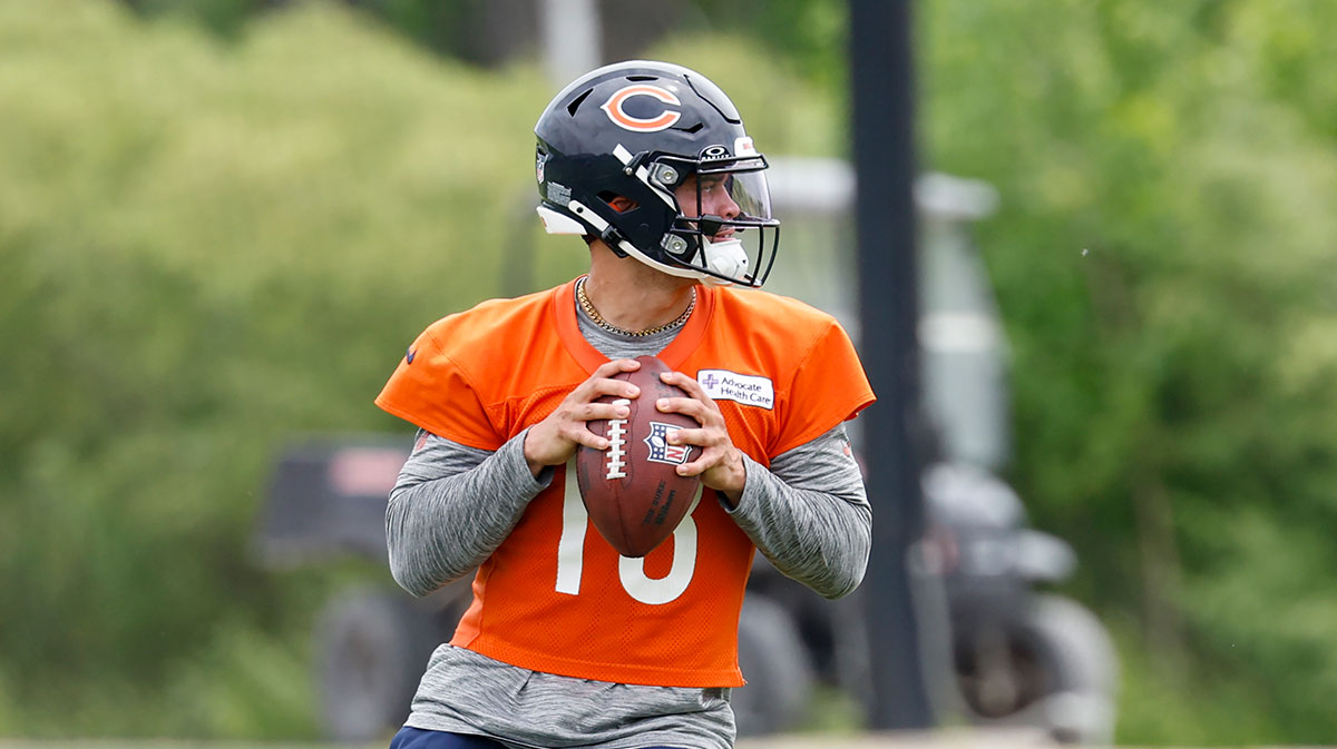 Chicago Bears quarterback Caleb Williams (18) looks to pass the ball during minicamp at Halas Hall.