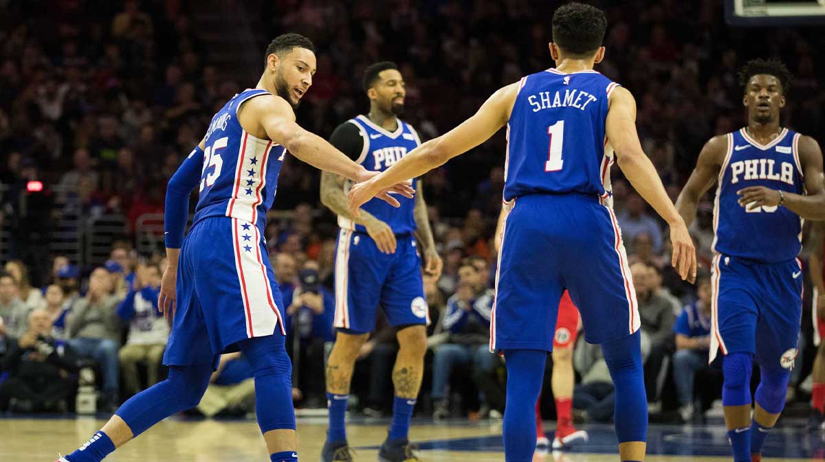 Philadelphia 76ers guard Landry Shamet (1) celebrates his three pointer with guard Ben Simmons (25) during the second quarter against the Washington Wizards at Wells Fargo Center. 
