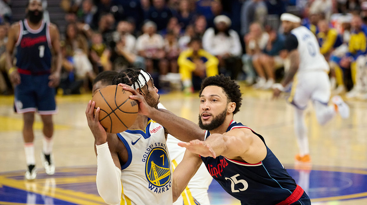 LA Clippers guard Ben Simmons (25) defends against Golden State Warriors guard Buddy Hield (7) during the third quarter at Chase Center.