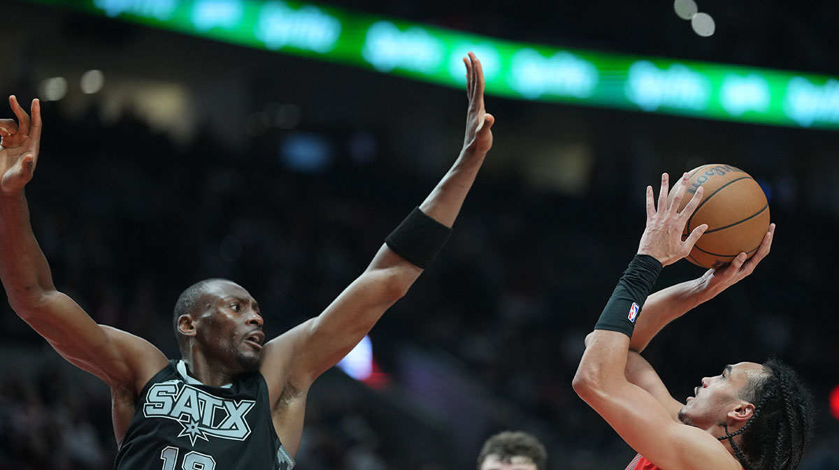 Portland Trail Blazers guard Dalano Banton (5) shoots over San Antonio Spurs center Bismack Biyombo (18) during the second half at Moda Center.