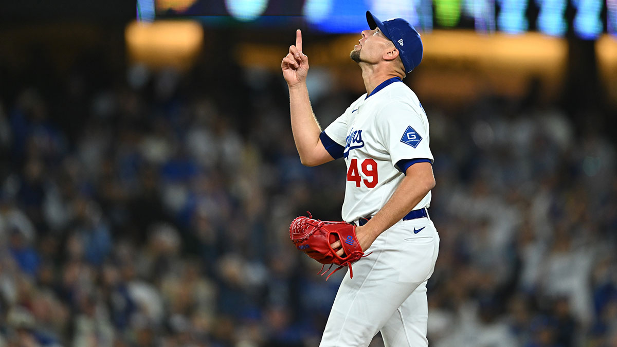 Mar 29, 2025; Los Angeles, California, USA; Los Angeles Dodgers pitcher Blake Treinen (49) reacts after defeating the Detroit Tigers at Dodger Stadium. 