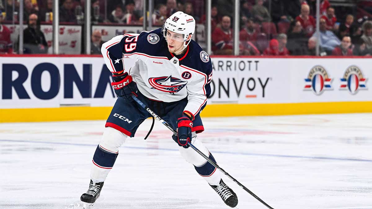 Columbus Blue Jackets right wing Yegor Chinakhov (59) plays the puck against the Montreal Canadiens during the third period at Bell Centre.