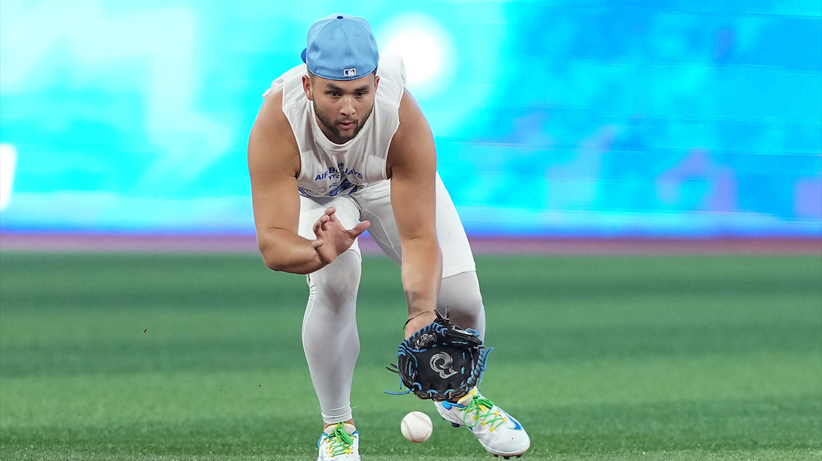 Toronto Blue Jays shortstop Bo Bichette (11) fields the ball during batting practice before a game against the New York Yankees at Rogers Centre.