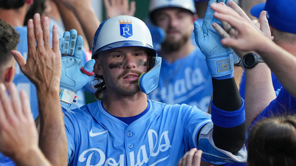 Kansas City Royals shortstop Bobby Witt Jr. (7) celebrates in the dugout after hitting a two run home run against the Cleveland Guardians in the fifth inning at Kauffman Stadium.