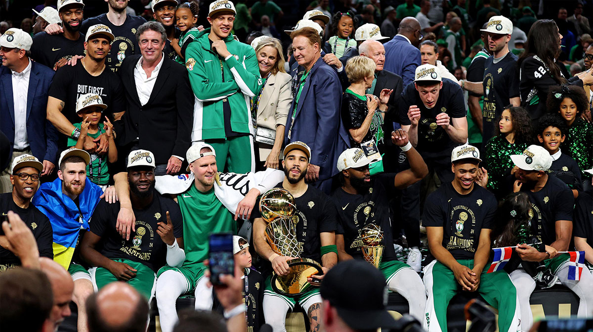 The Boston Celtics celebrate after having beaten the Dallas Mavericks in the five game of the NBA 2024 final at the NBA championship at TD Garden.