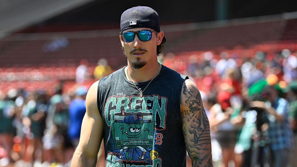Boston Red Sox left fielder Jarren Duran (16) walks out to take photos with fans before a game against the Toronto Blue Jays at Fenway Park. Mandatory Credit: Eric Canha-Imagn Images