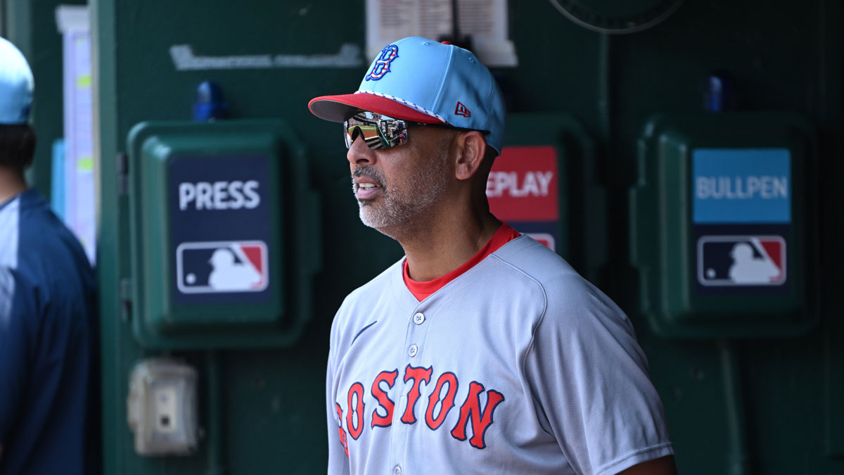 Boston Red Sox manager Alex Cora (13) stands in the dugout during the eighth inning of a game against the Washington Nationals at Nationals Park.