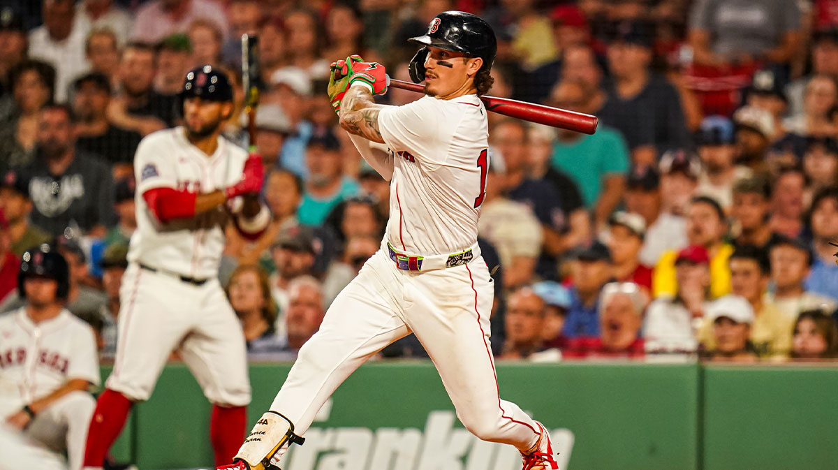 Boston Red Sox outfielder Jarren Duran (16) hits a single to drive in a run against the Colorado Rockies in the sixth inning at Fenway Park. Escobar