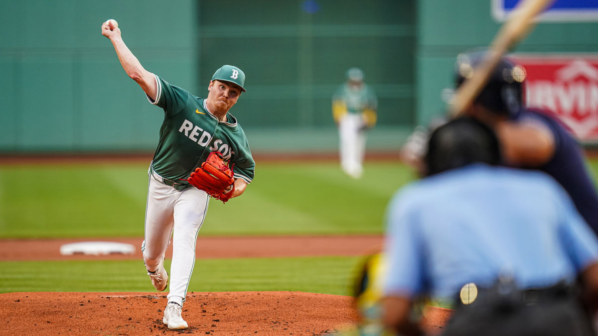 Boston Red Sox pitcher Hunter Dobbins (73) throws a pitch against the Tampa Bay Rays in the first inning at Fenway Park.
