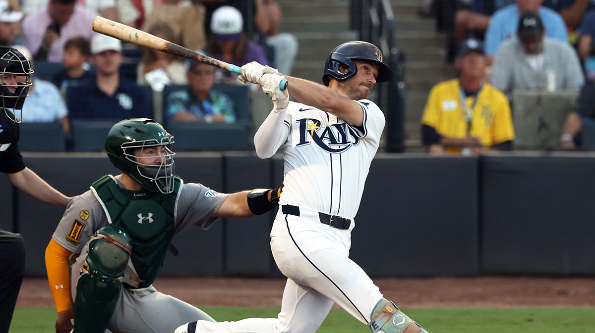 Tampa Bay Rays second base Brandon Lowe (8) hits a home run against the Athletics during the third inning at George M. Steinbrenner Field.