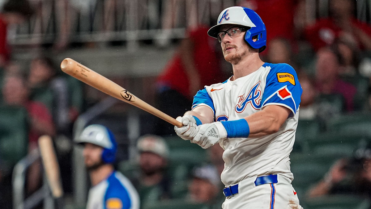 Atlanta Braves catcher Sean Murphy (12) watches the ball after hitting a grand slam home run against the Philadelphia Phillies during the seventh inning at Truist Park.