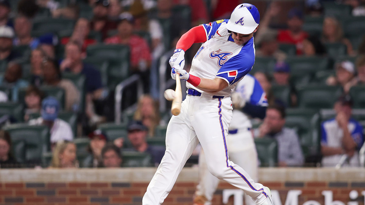 Atlanta Braves right fielder Jarred Kelenic (24) hits a single against the Minnesota Twins in the sixth inning at Truist Park.