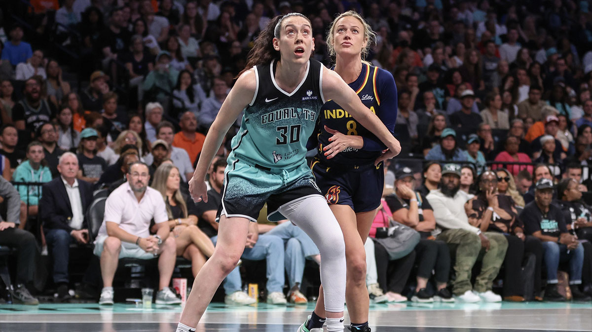 New York Liberty forward Breanna Stewart (30) and Indiana Fever guard Sophie Cunningham (8) box out for a rebound in the third quarter at Barclays Center.