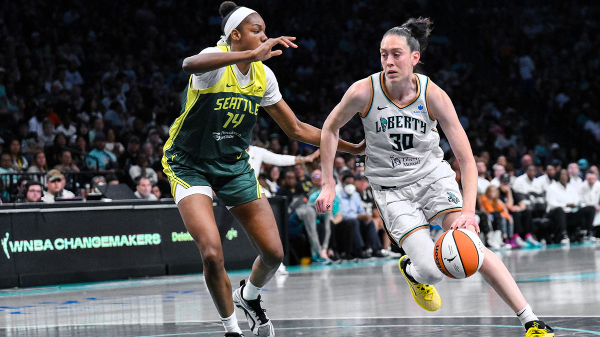 New York Liberty forward Breanna Stewart (30) drives to the basket defended by Seattle Storm center Dominique Malonga (14) during the second half at Barclays Center.
