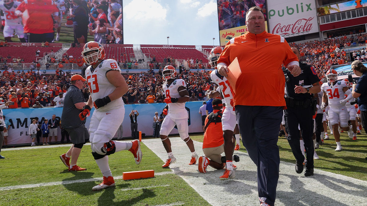 Illinois Fighting Illini head coach Bret Bielema takes the field fro the the 2023 ReliaQuest Bowl against the Mississippi State Bulldogs at Raymond James Stadium.