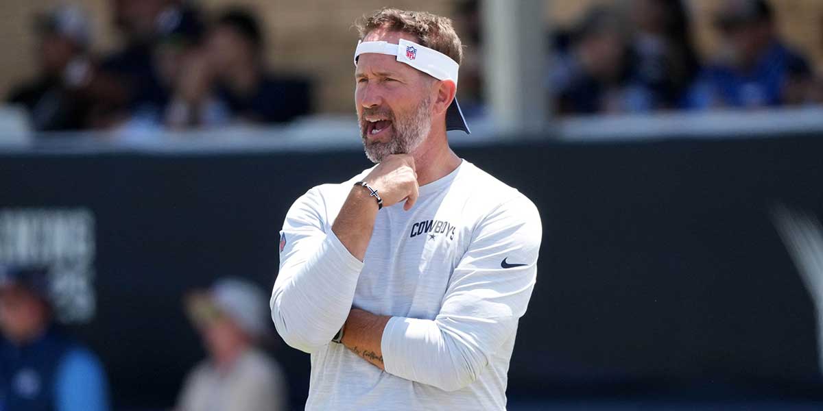 Dallas Cowboys coach Brian Schottenheimer at training camp