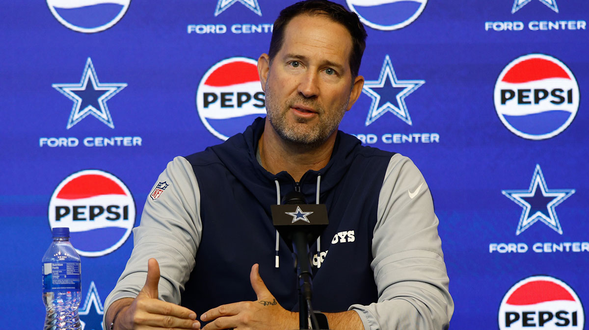 Dallas Cowboys head coach Brian Schottenheimer addresses the media before practice at the Ford Center at the Star Training Facility in Frisco, Texas.