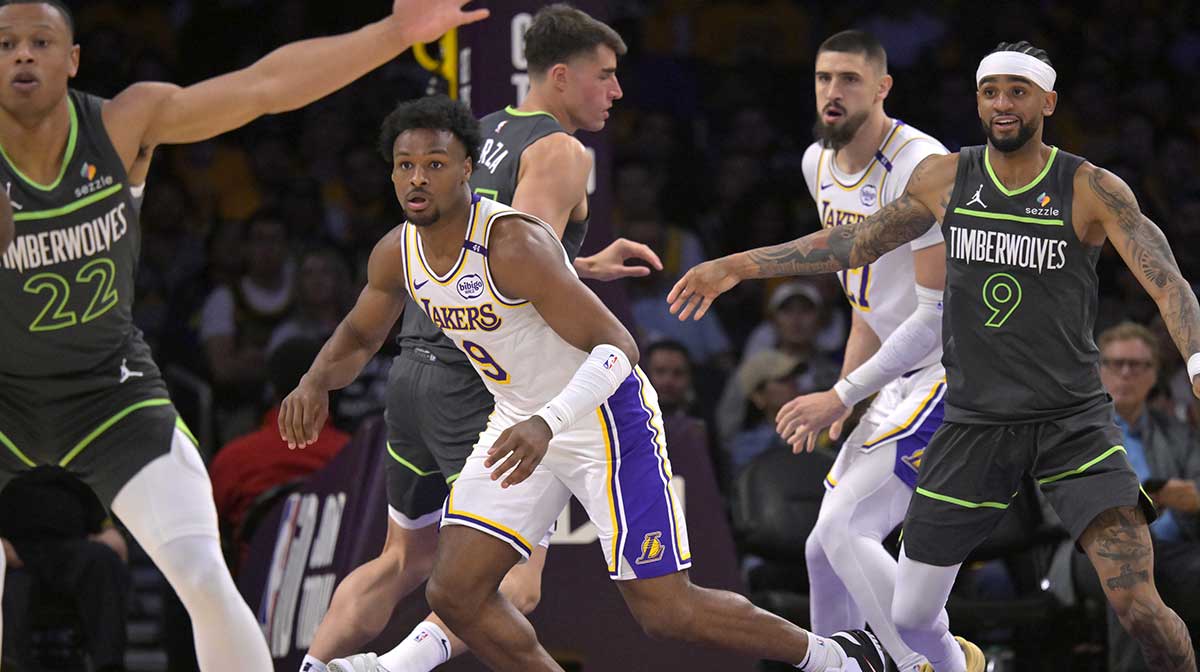 Lakers guard Bronny James (9) defends on the court in the second half against the Minnesota Timberwolves at Crypto.com Arena.