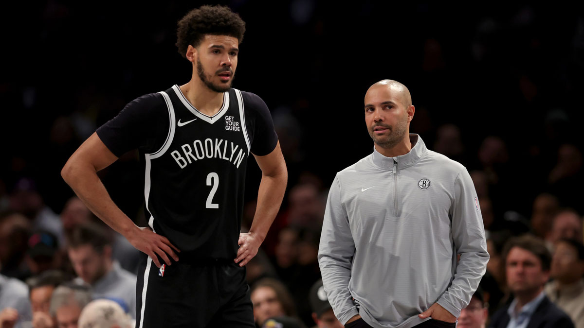Brooklyn Nets head coach Jordi Fernandez talks to forward Cameron Johnson (2) during the fourth quarter against the Los Angeles Lakers at Barclays Center.