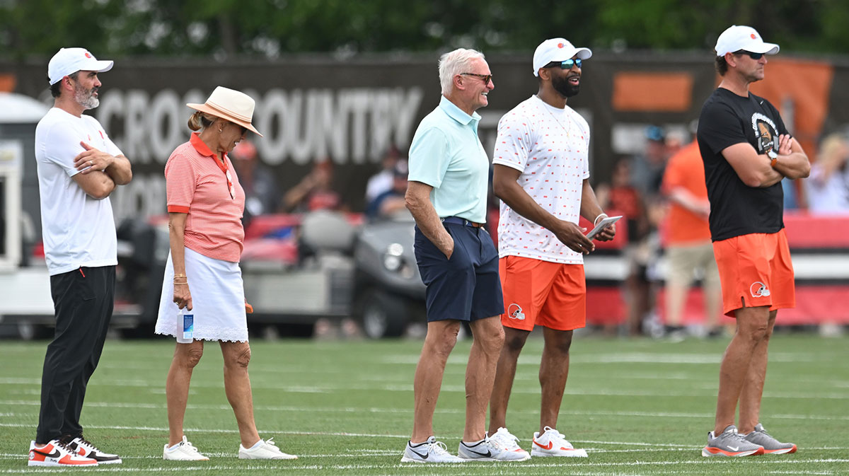 Cleveland Browns head coach Kevin Stefanski, left, managing and principal partners Dee Haslam, second left, and Jimmy Haslam, middle, and executive vice president, football operations & general manager Andrew Berry, and executive vice president, partner JW Johnson, right, watch during training camp at CrossCountry Mortgage Campus. 