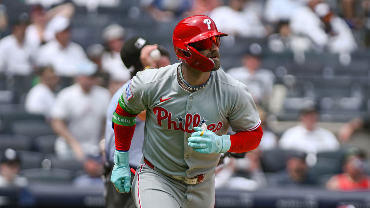 Philadelphia Phillies first baseman Bryce Harper (3) runs the bases after hitting a solo home run against the New York Yankees during the third inning at Yankee Stadium.