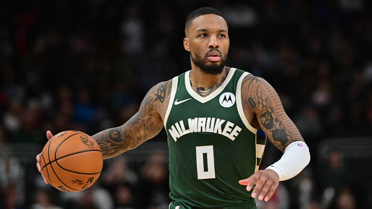 Milwaukee Bucks guard Damian Lillard (0) brings the ball downcourt in the fourth quarter against the Chicago Bulls at Fiserv Forum.