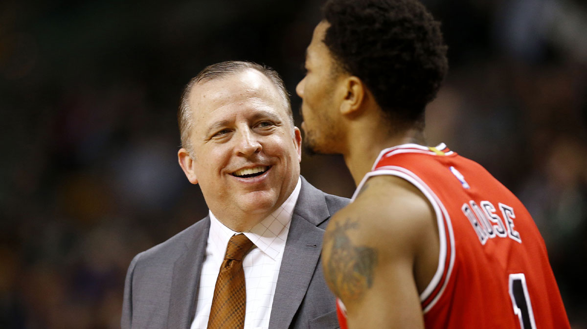 Bulls head coach Tom Thibodeau smiles at Chicago Bulls guard Derrick Rose