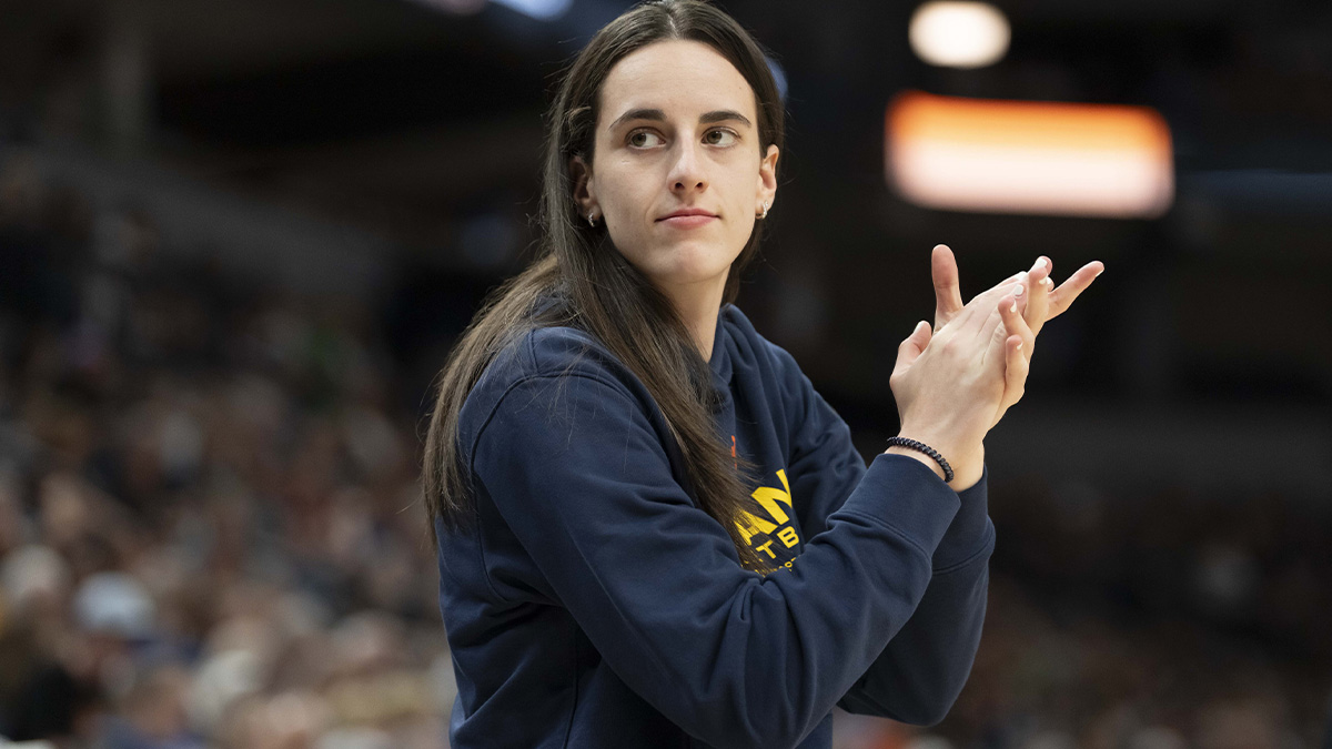 Indiana Fever guard Caitlin Clark (22) looks on against the Minnesota Lynx in the second half during the Commissioner's Cup final at Target Center.